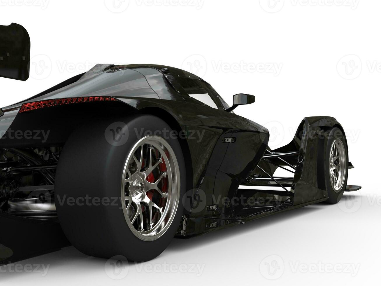 Modern shiny black super sports race car - rear wheel closeup shot photo