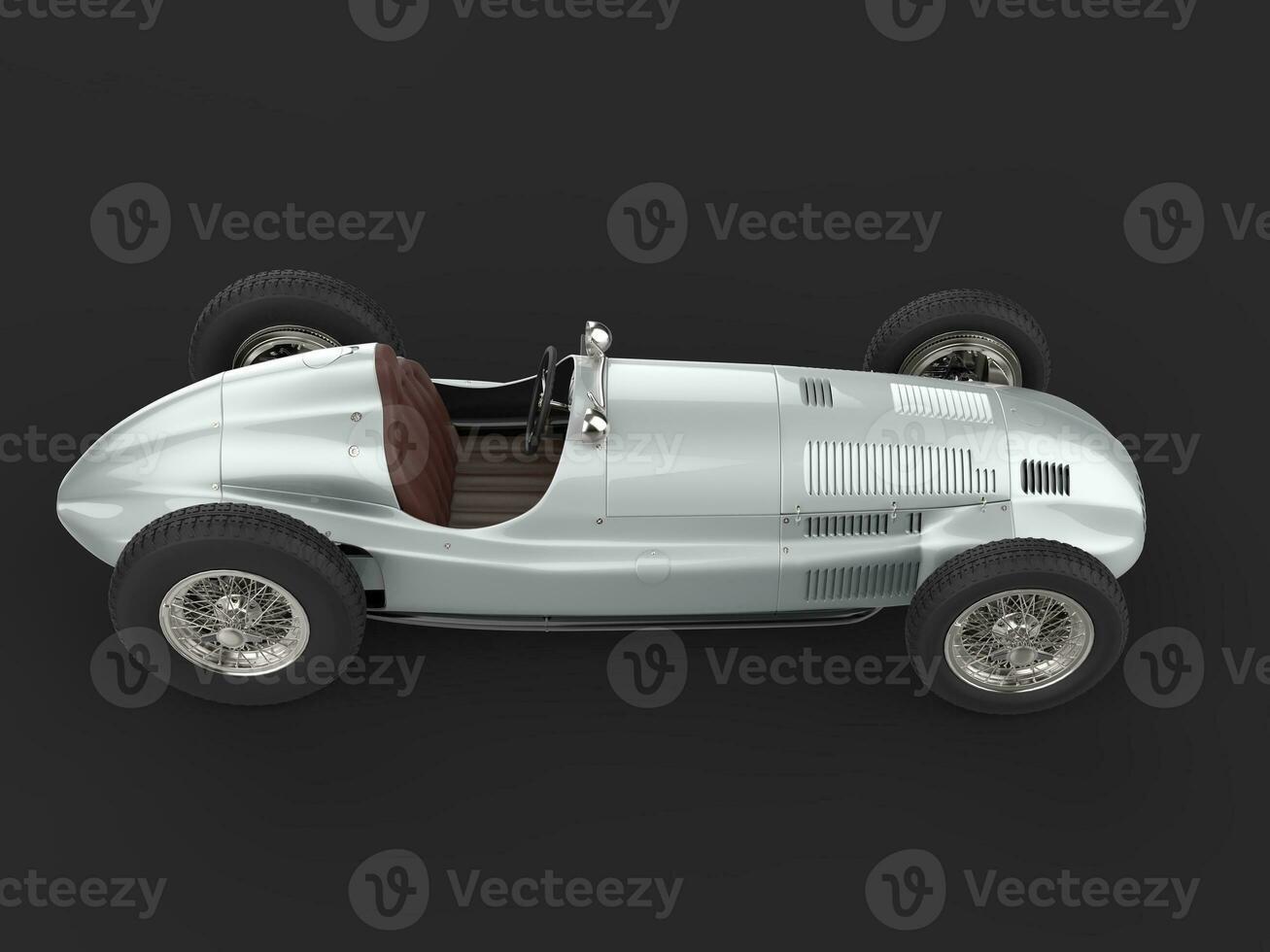 Old vintage race car in metallic silver color - top down view photo