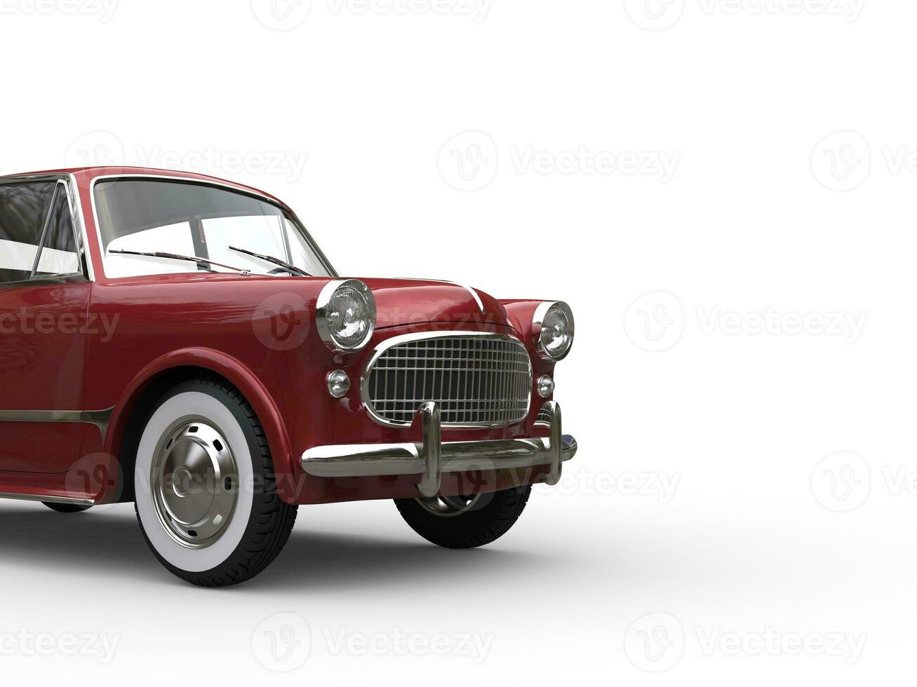 Metallic cherry red vintage small compact car - closeup cut shot photo