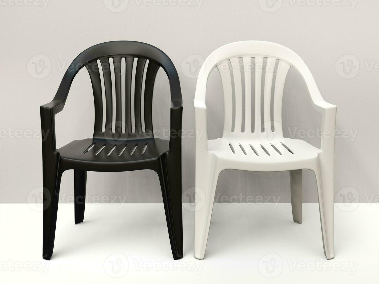 Black and white generic plastic chairs side by side photo