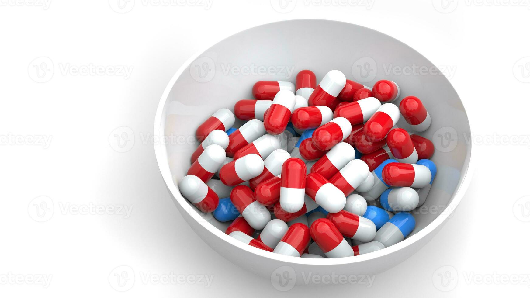 White ceramic bowl filled with red and blue pills - isolated on white background photo