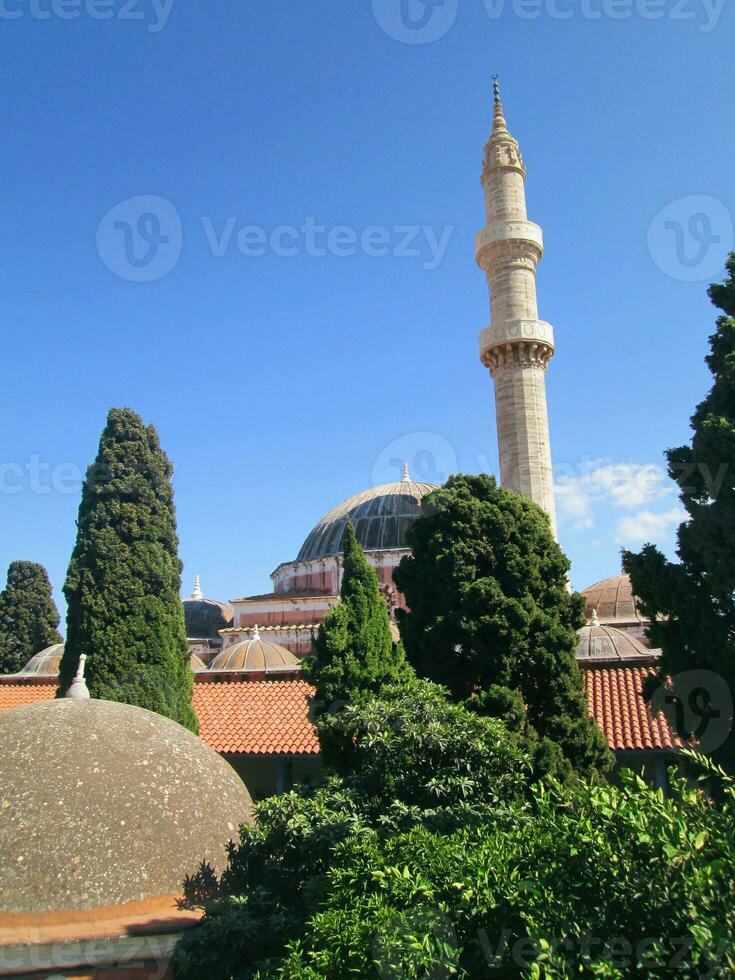 Old minaret in the background photo