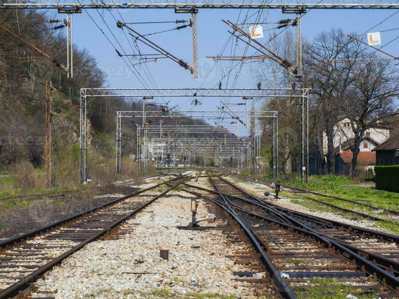 Train rails crossing photo