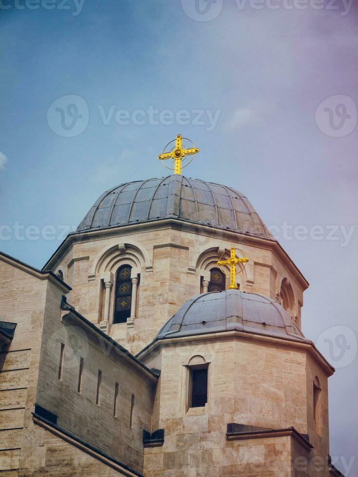 St.Luke orthodox church dome with golden crosses photo