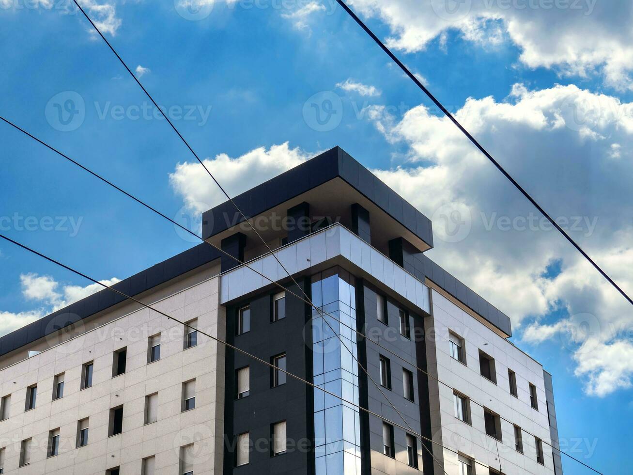 Modern business building - black steel, glass and concrete photo