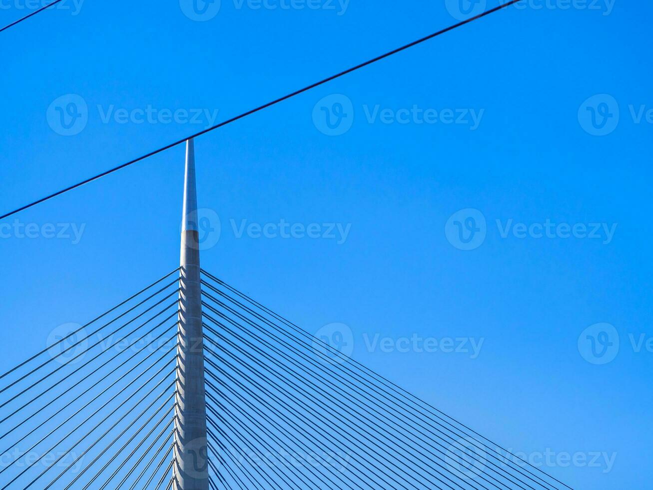 Top of big suspension bridge in Belgrade - clear sky background photo