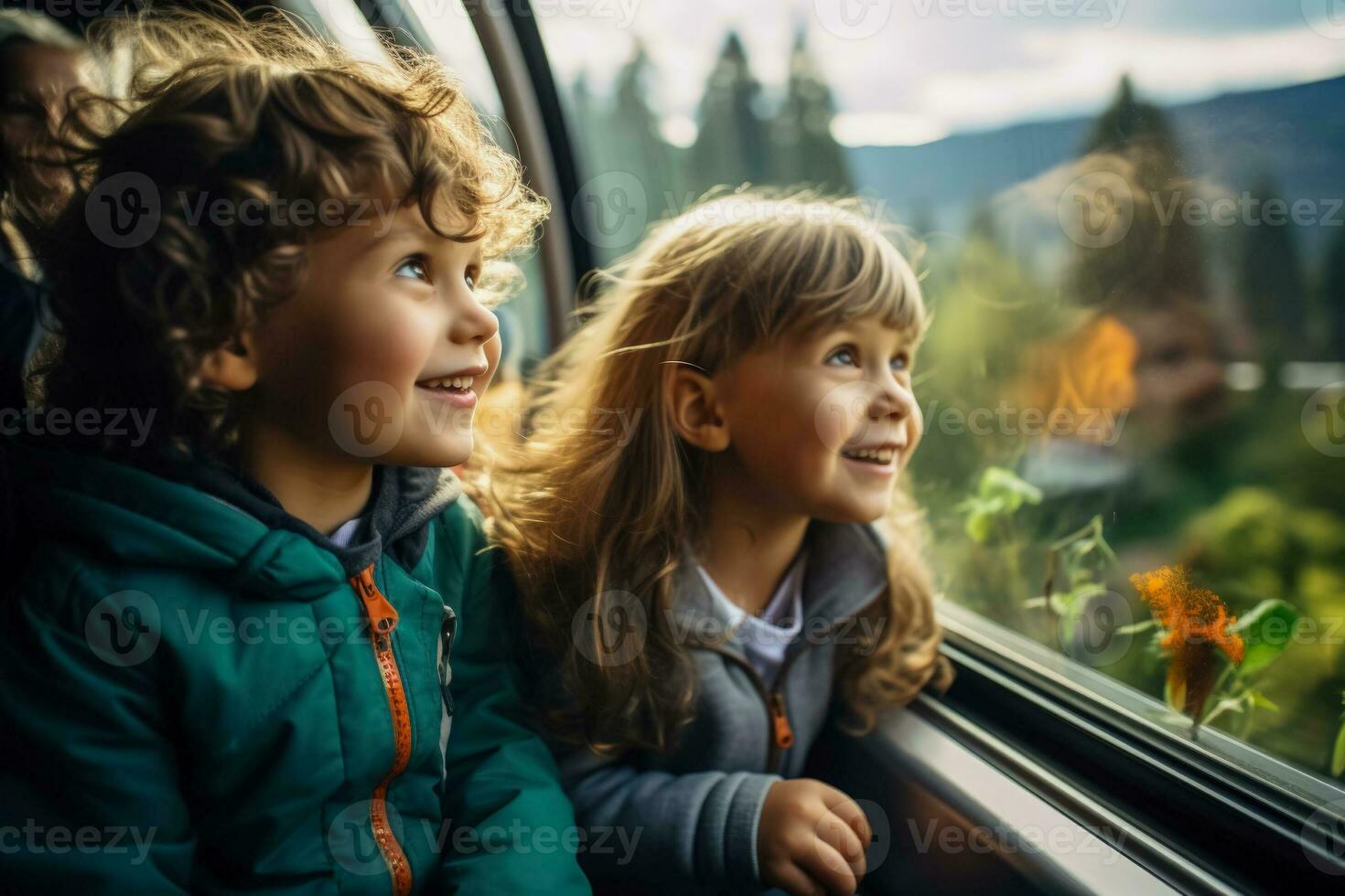 Children looking out of train windows in awe photo