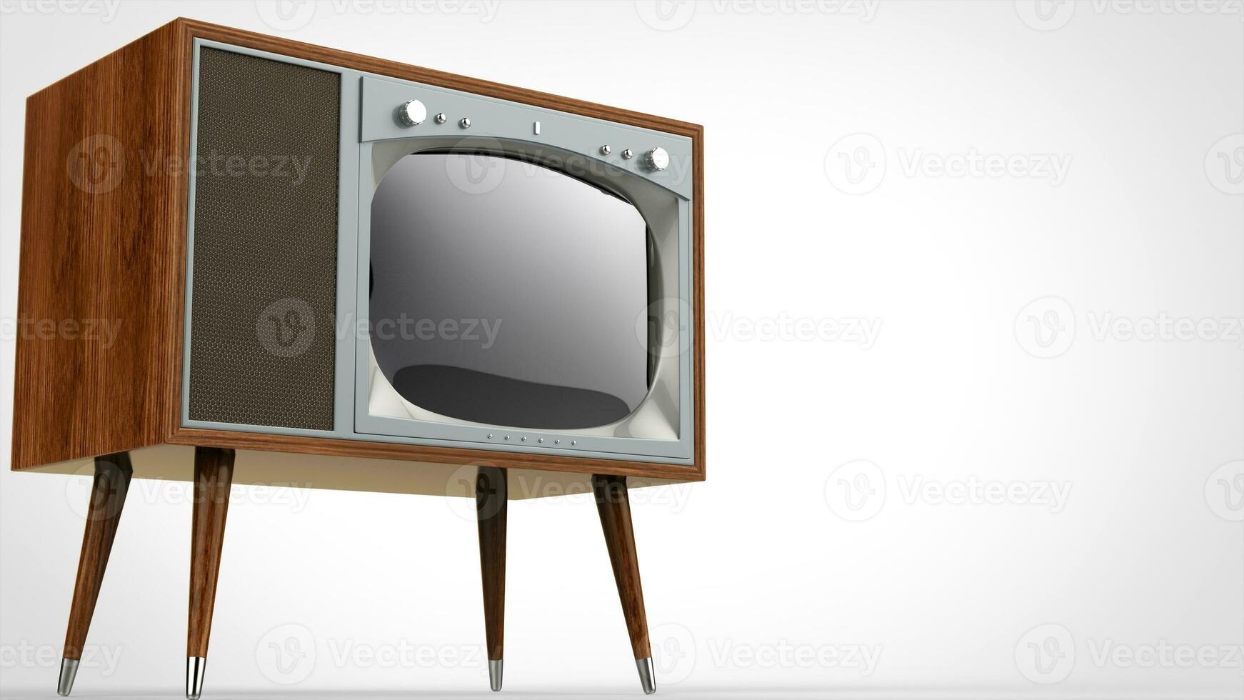 Dark wooden vintage TV set with silver front and legs photo
