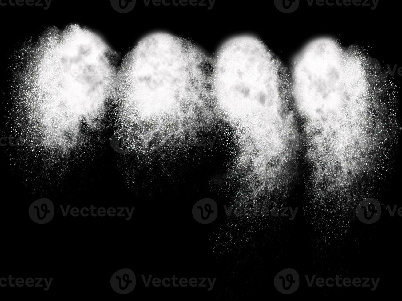 Four different white particle explosions photo