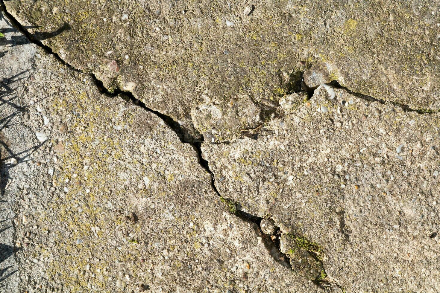 Cracked and abstract grunge texture. Aged material surface backdrop. Weathered effect pattern. Old and dirty background. photo