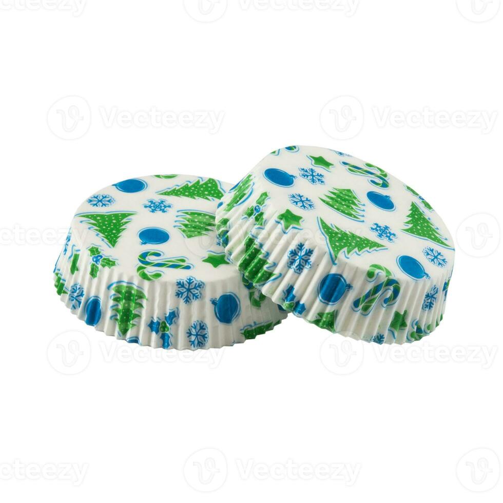 Flat white paper baking forms for muffins and cupcakes with New Year holiday pattern photo