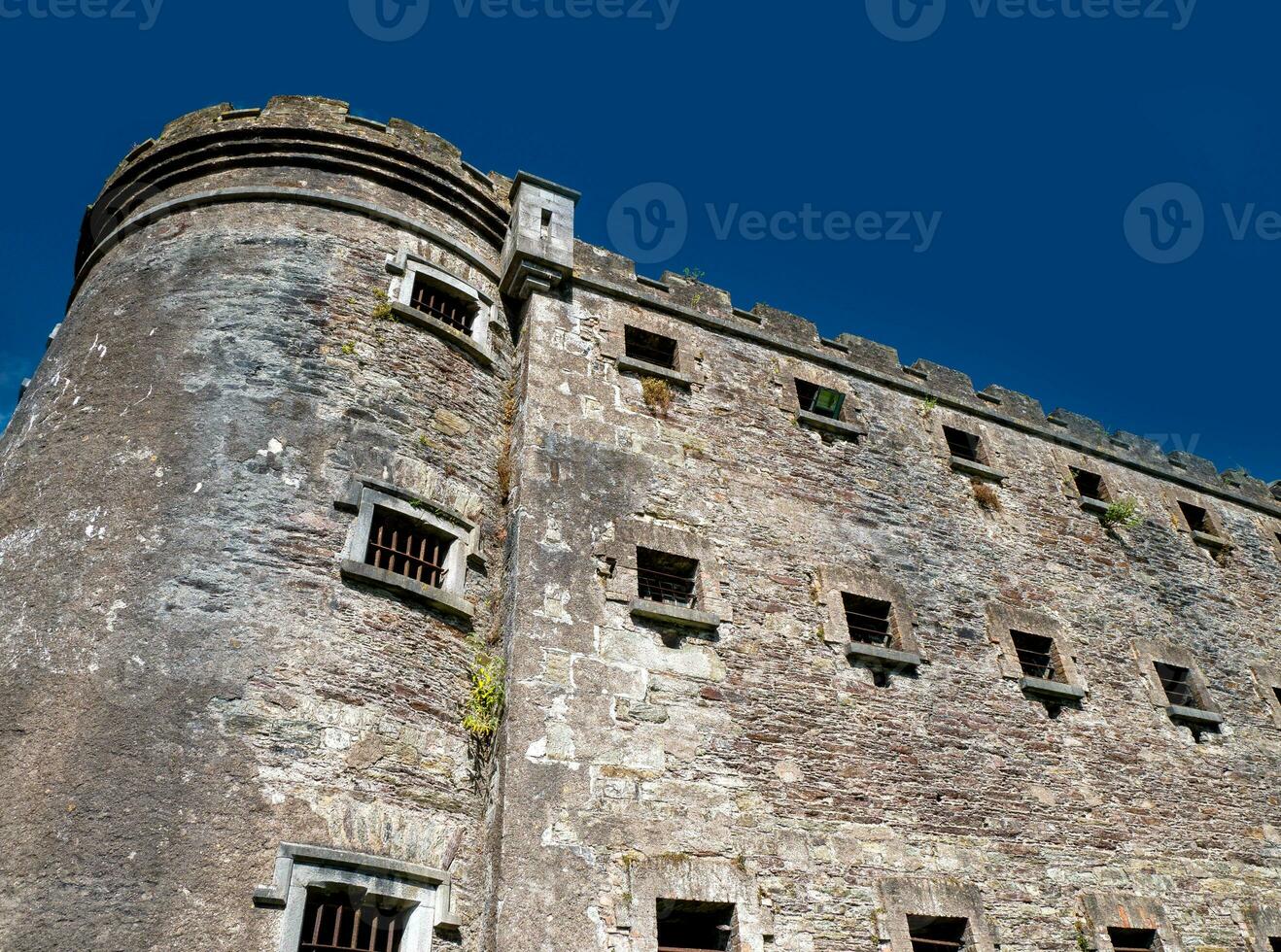 Old celtic castle tower walls, Cork City Gaol prison in Ireland. Fortress, citadel background photo