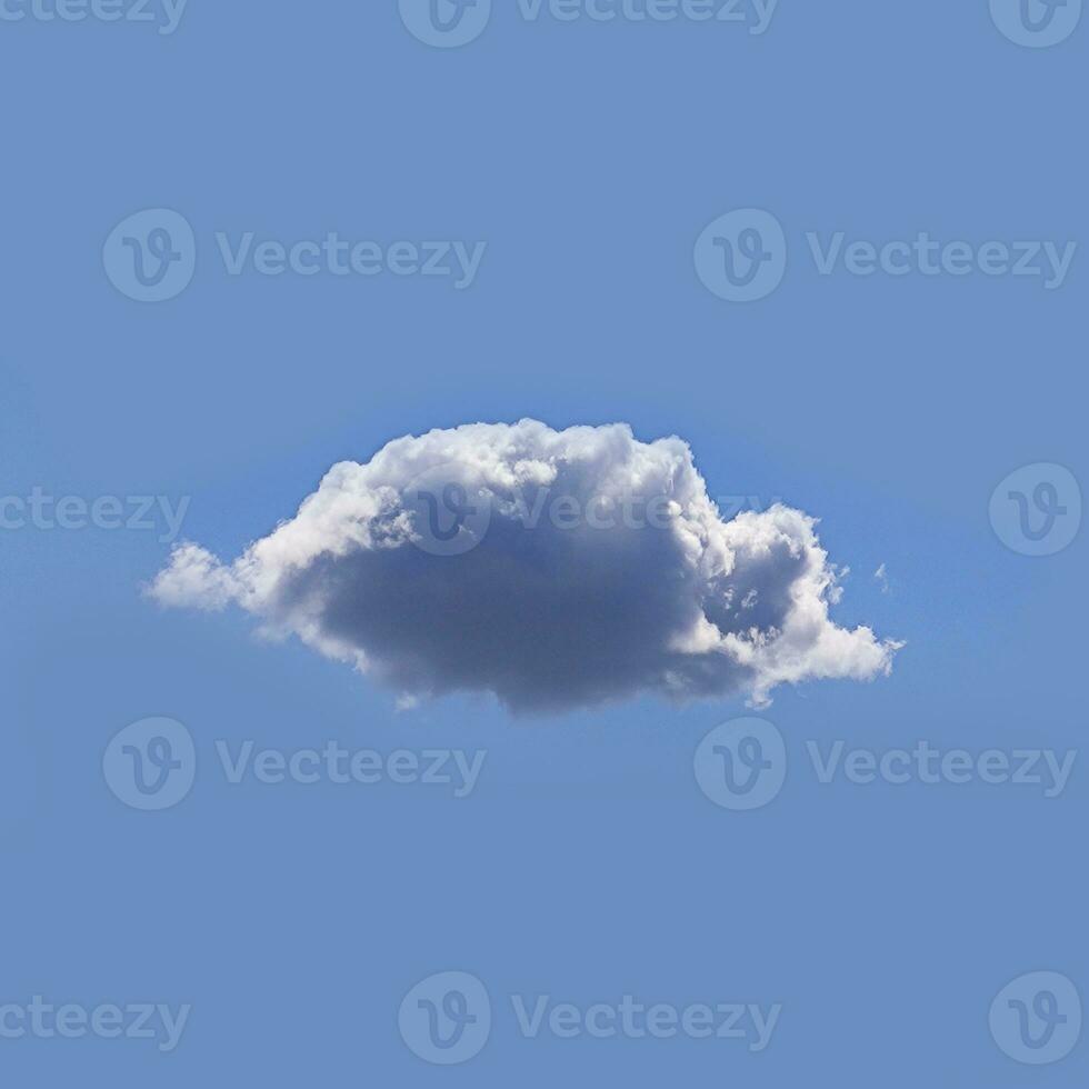 Single white cloud isolated over blue sky background photo