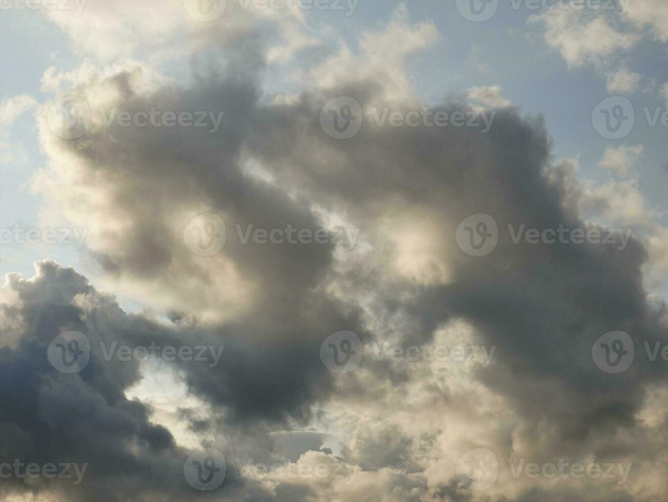 Stormy sky with white and grey clouds background, beautiful sunset heaven photo