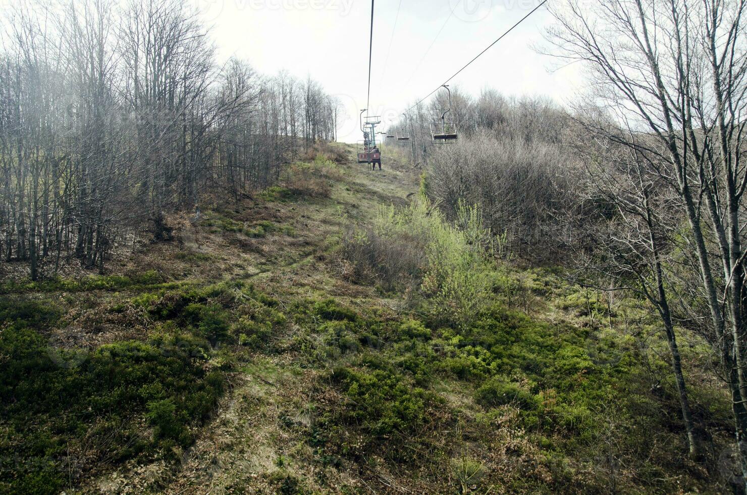 Chairlift in the mountains photo