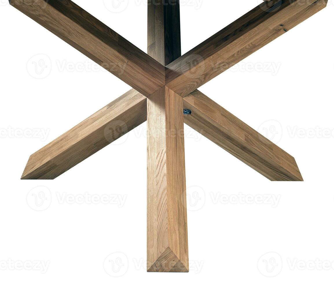 Wooden table legs isolated over white background, close view photo, crossed star shaped legs, wooden eco furniture elements background. Solid wood furniture details photo