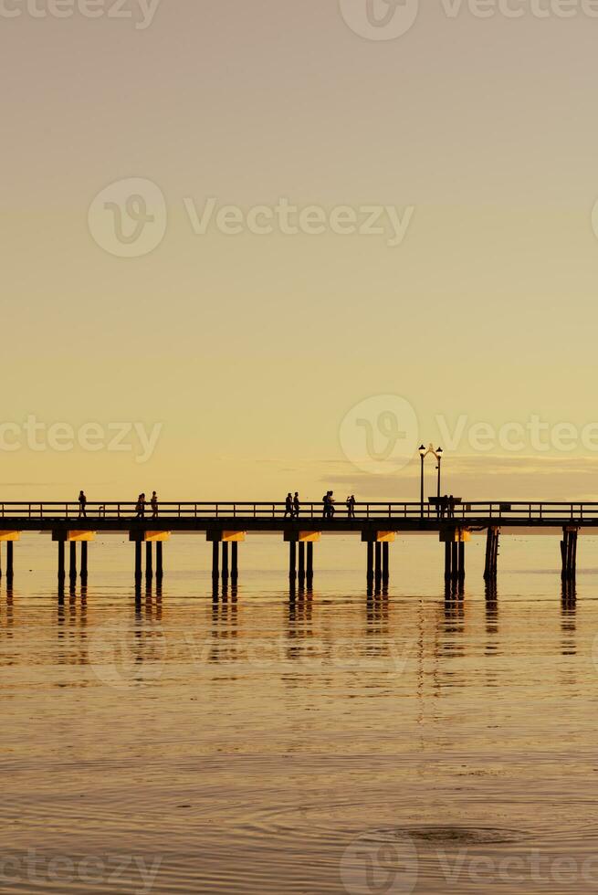 Spectacular sunset on the ocean pier photo