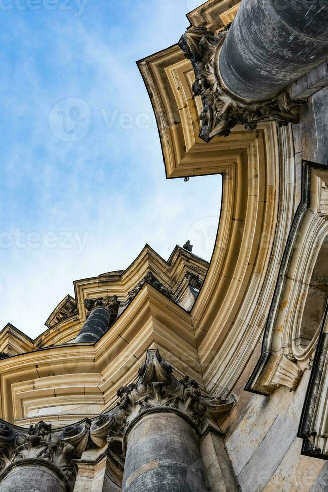 Bottom up view on an ancient cathedral photo