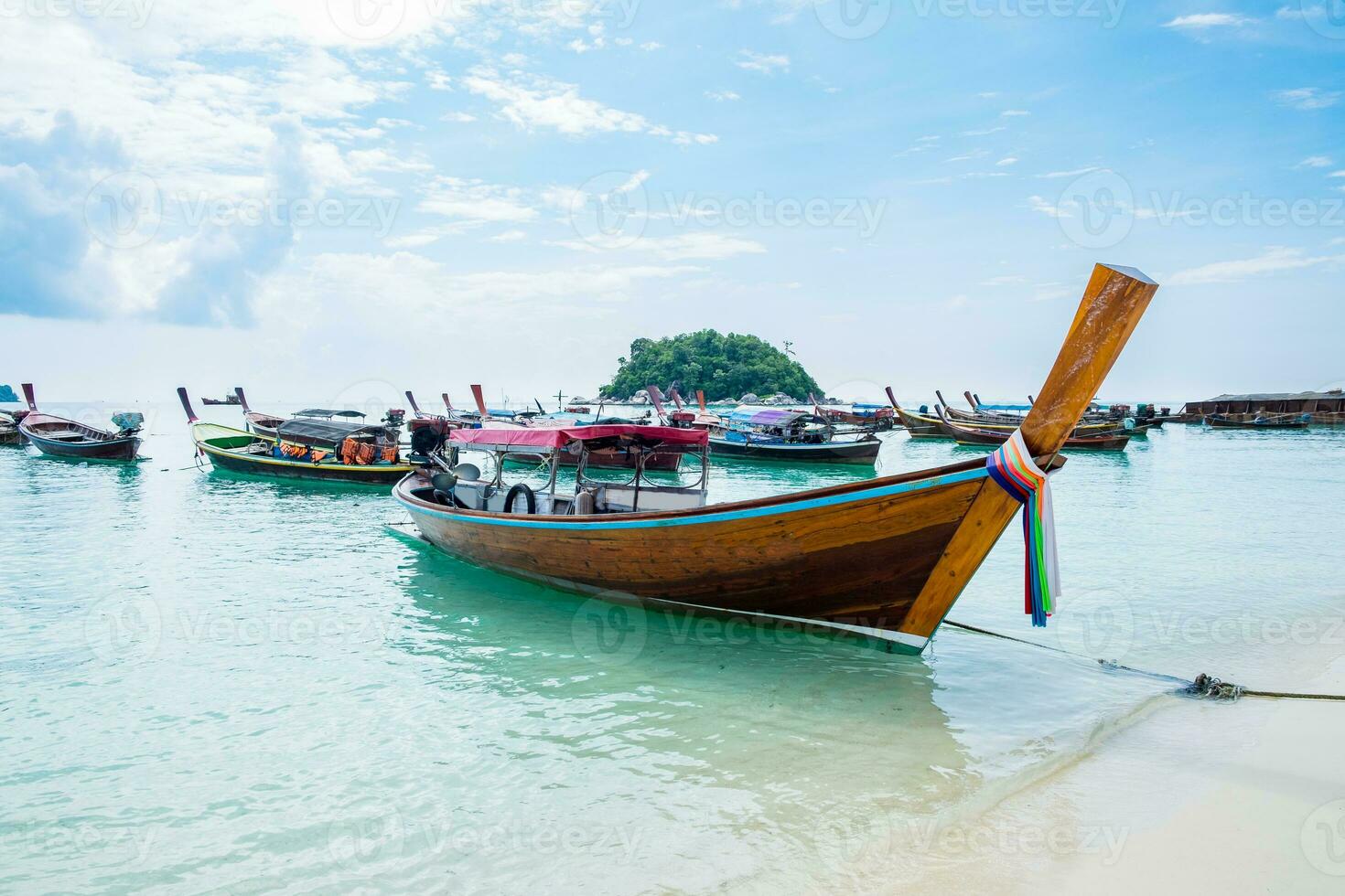 Sea beach with group long tail boat anchor coast photo