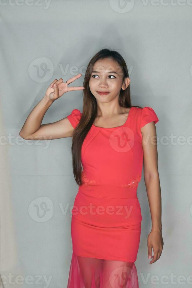 pretty young girl Balinese Asian, Indonesian girl business pose model for advertisement glasses, skincare fashion style photo