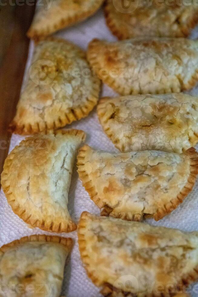Freshly made curry puffs photo