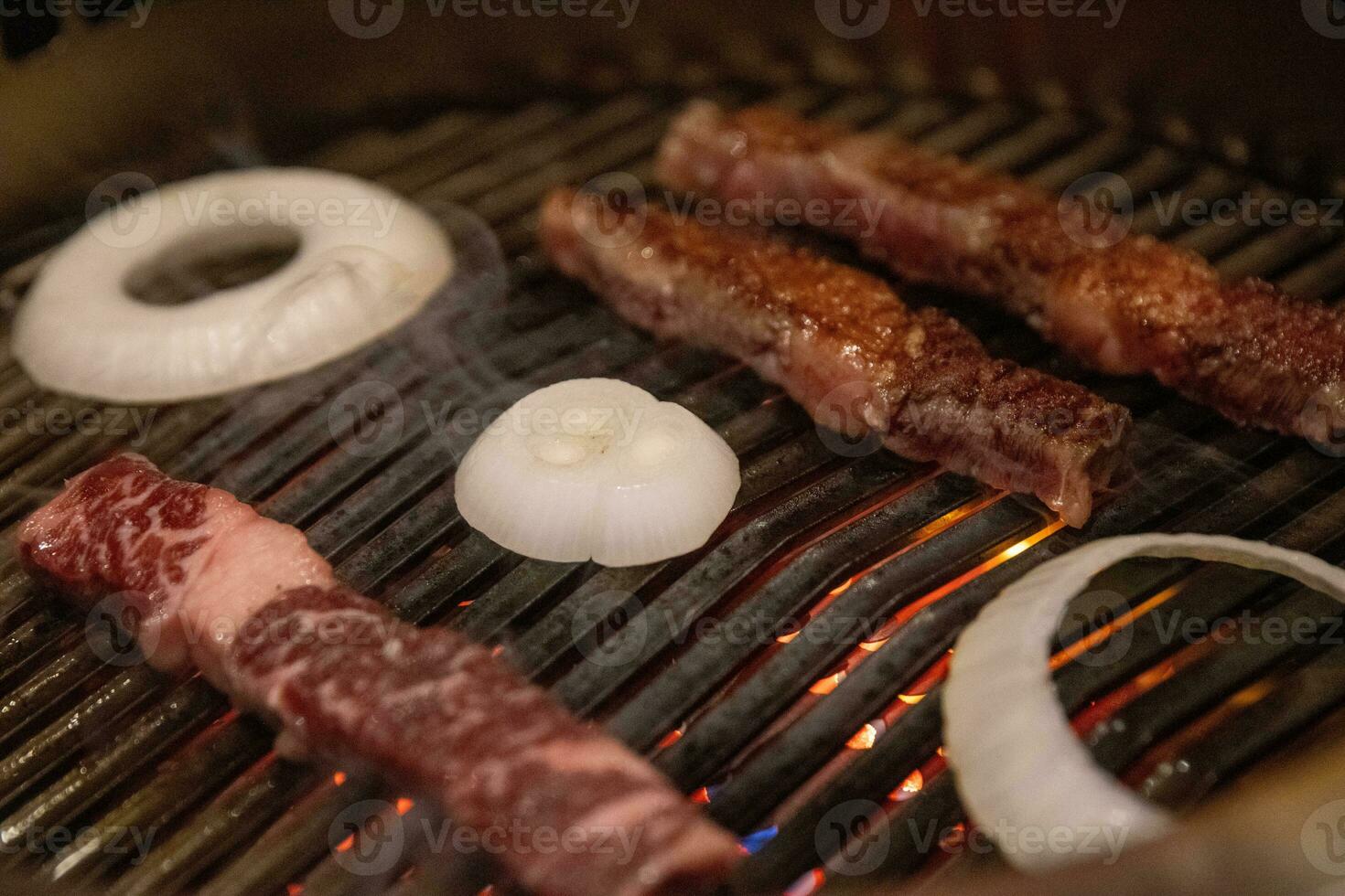 Grilling Wagyu and Onions photo