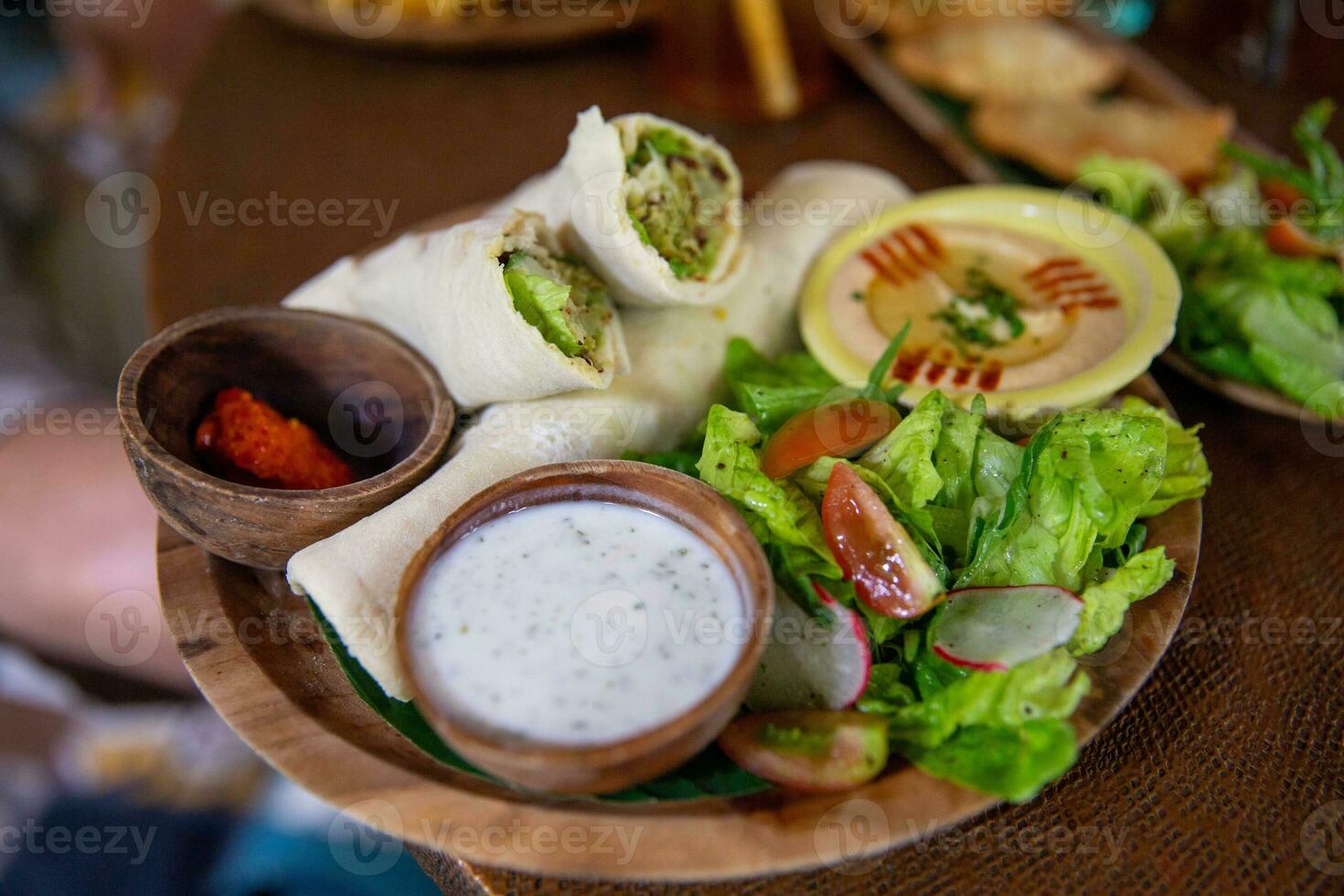 Chicken wrap with hummus photo