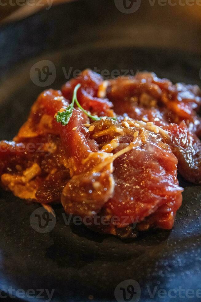 Marinated raw beef photo