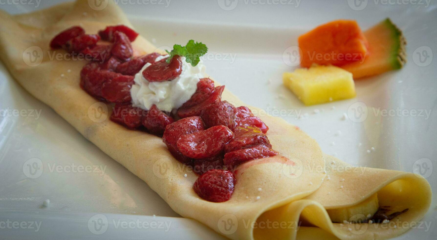 Crepe Topped with Strawberries photo