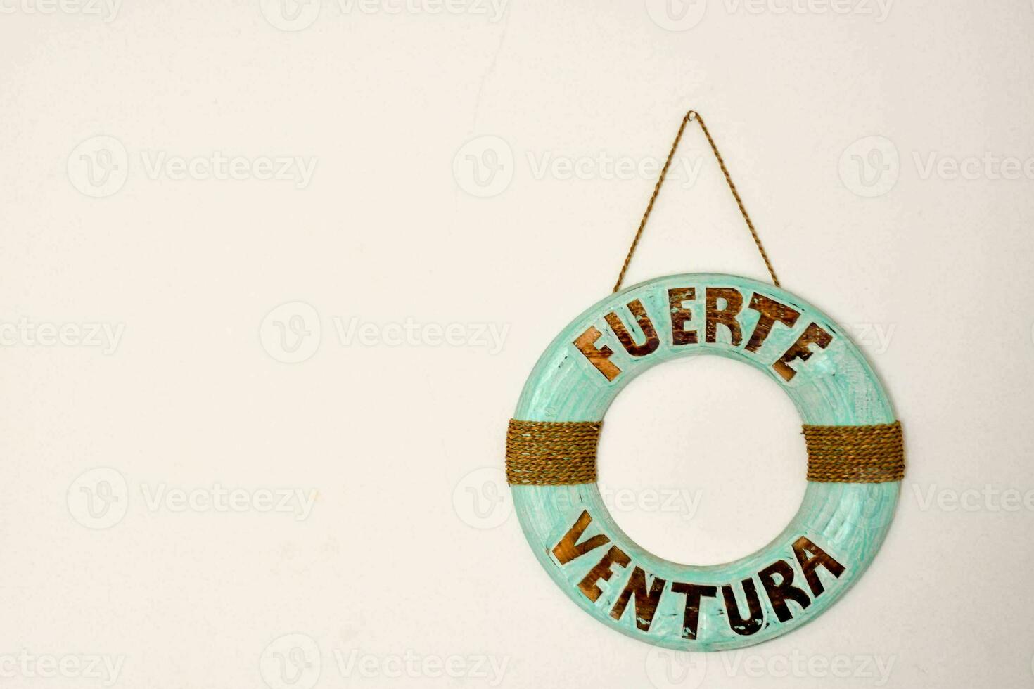 a round sign with the word fuerte ventura written on it photo