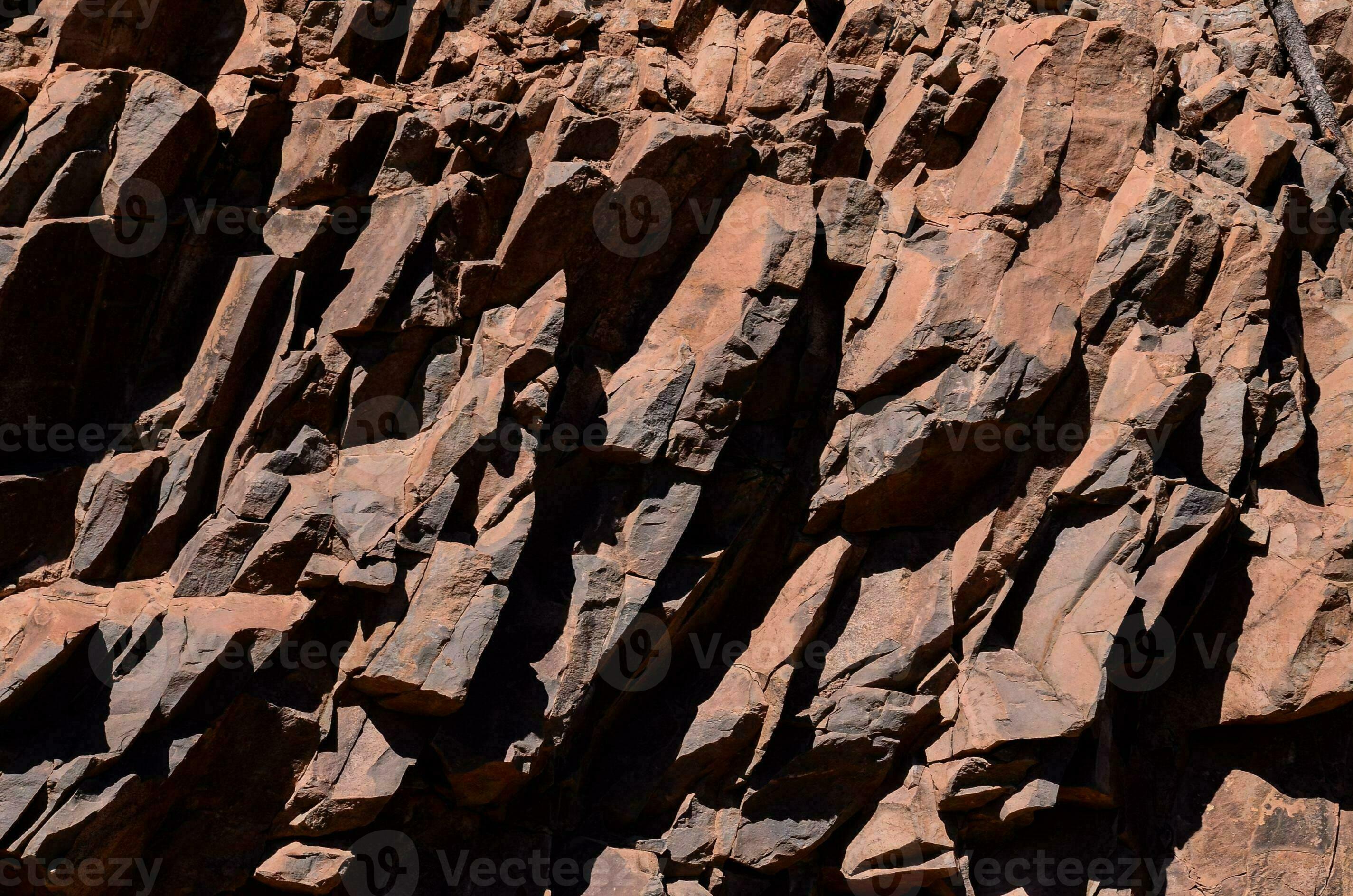a jagged rock face 31214383 Stock Photo at Vecteezy a jagged rock face 31214383 Stock Photo at Vecteezy