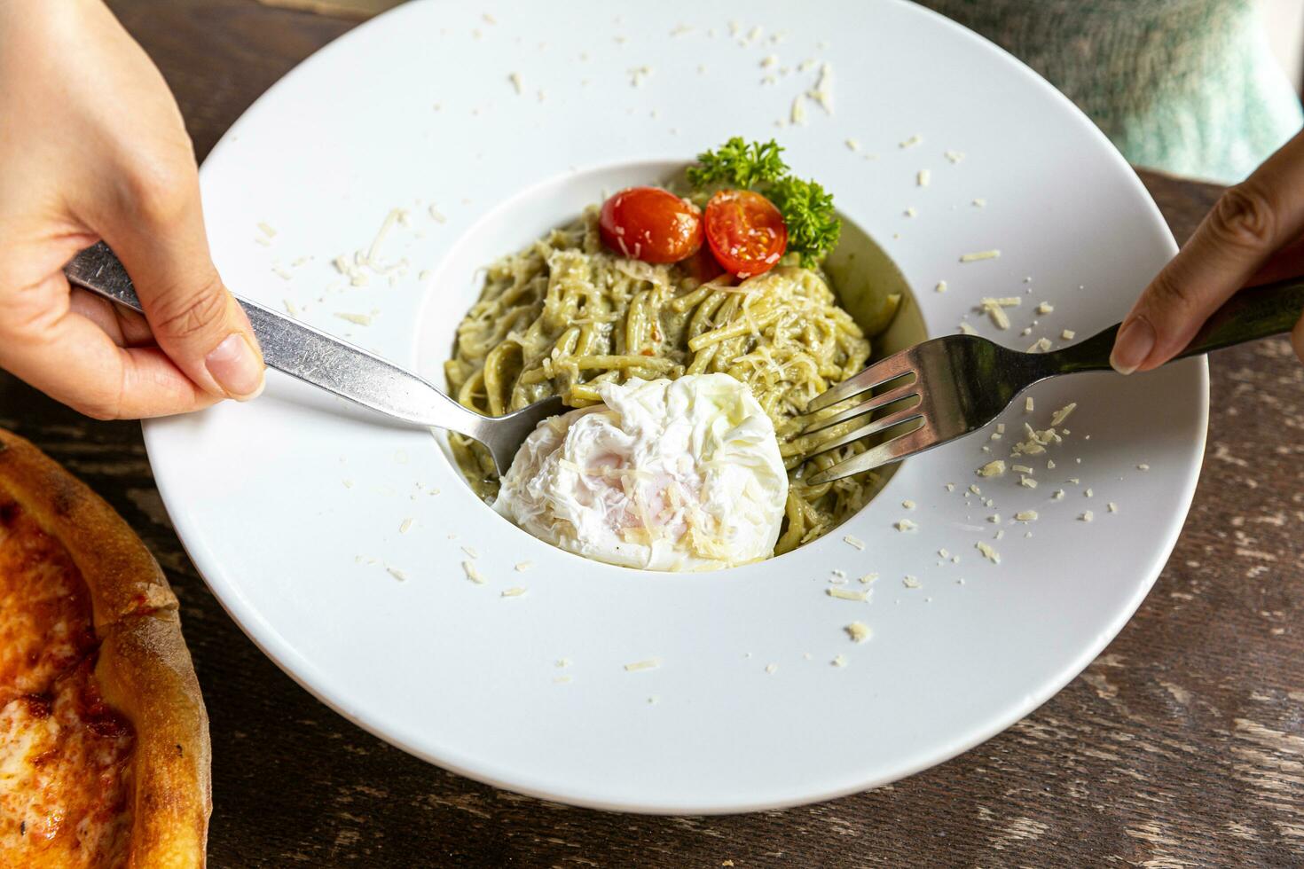 Pasta spaghetti with pesto sauce in bowl. Light grey background.Top view. Egg and bacon spaghetti carbonara. photo