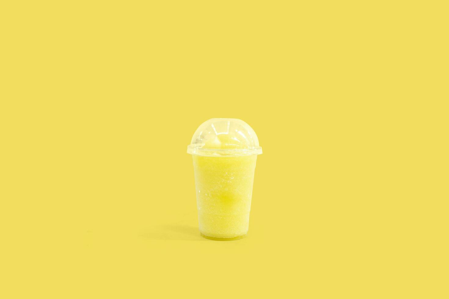 Fresh molasses smoothie in plastic cups take away on background, Fruit drink for healthy concept photo