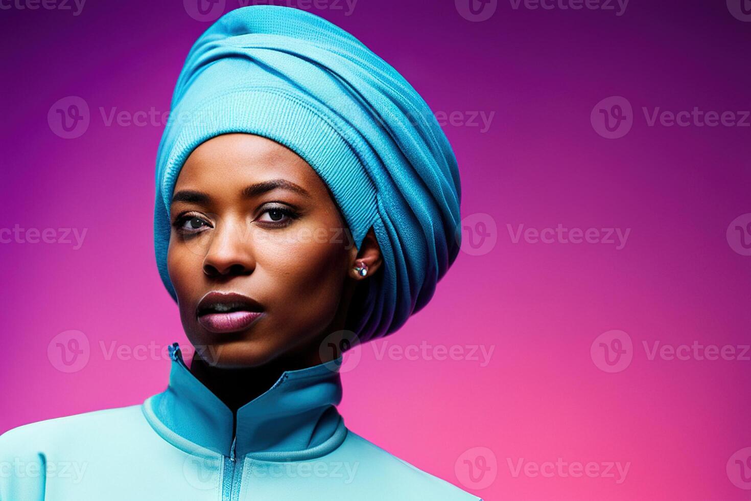 Young African-American girl in blue clothes with hood against bright colored photo