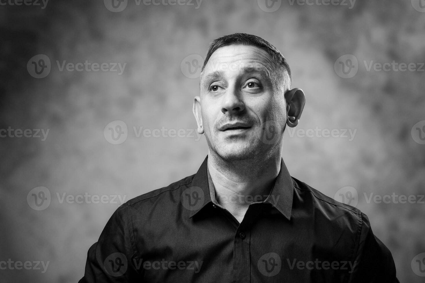 black and white portrait of a man in a shirt photo