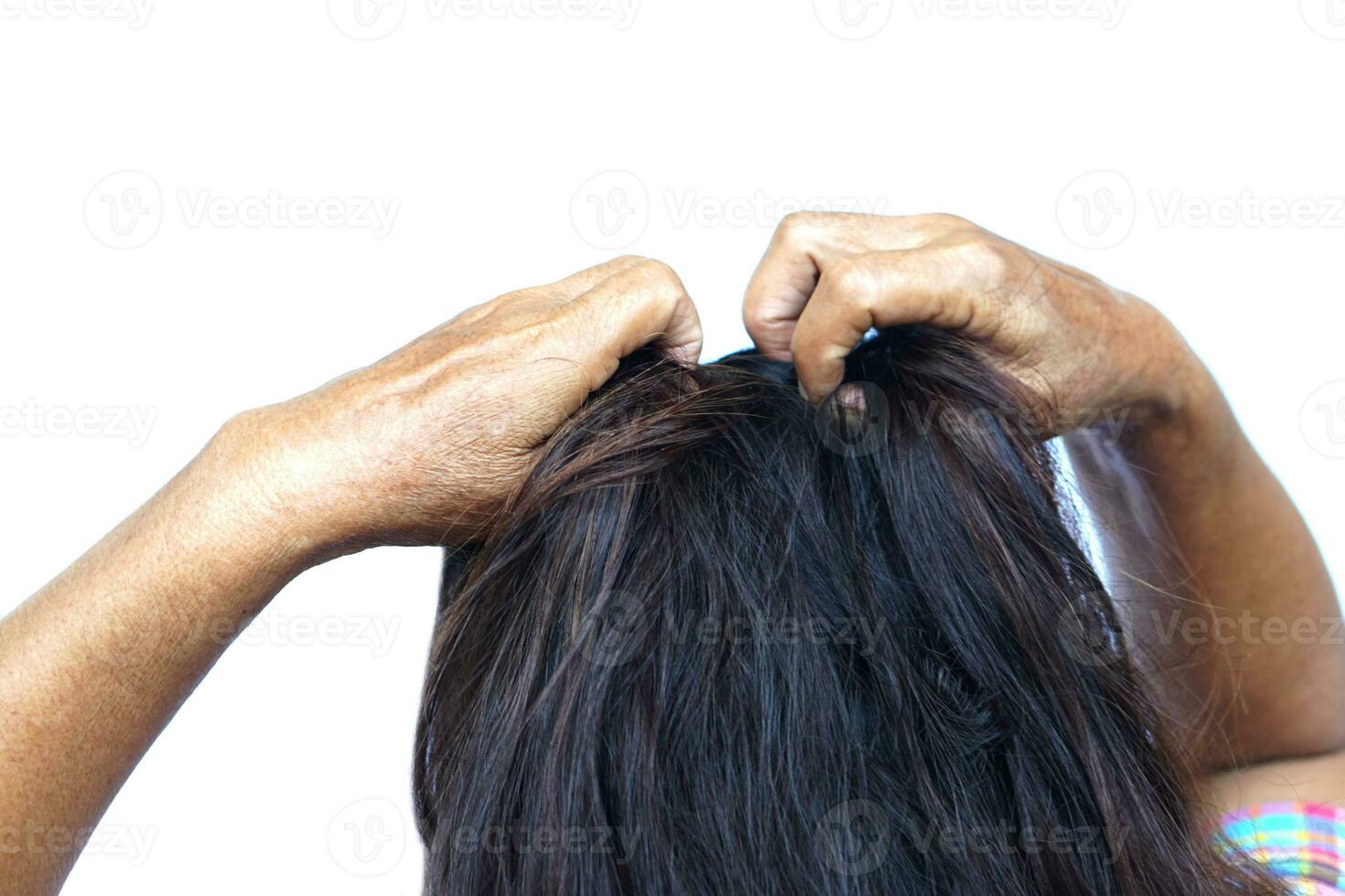 Woman use hands to scratch her itcy hair on head, isolated on white background. Concept, Hair health problems. Dandruff, fungus on scalp, allergic to shampoo or louse. photo