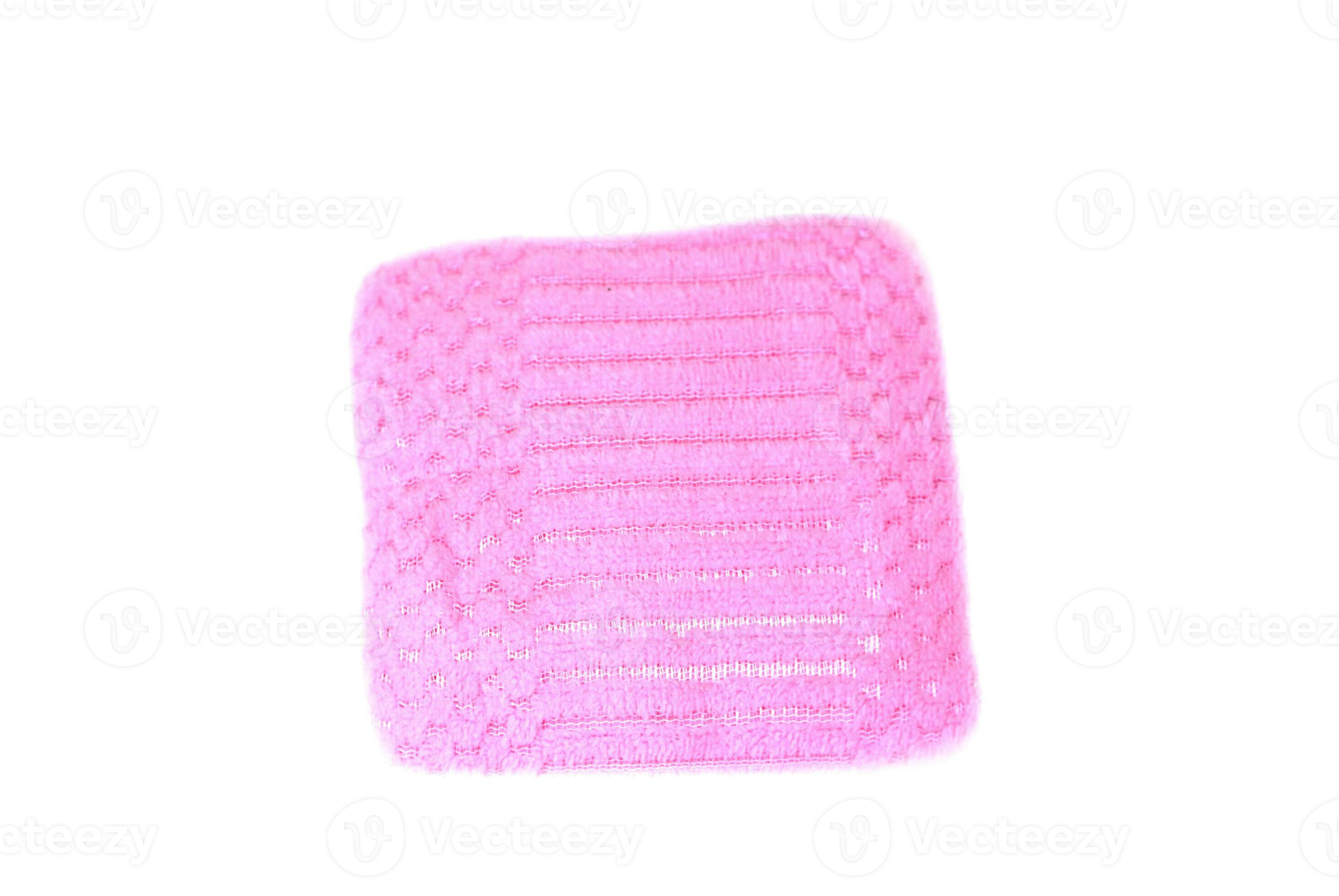 Pink cotton towel isolated on white background. Concept, soft fabric