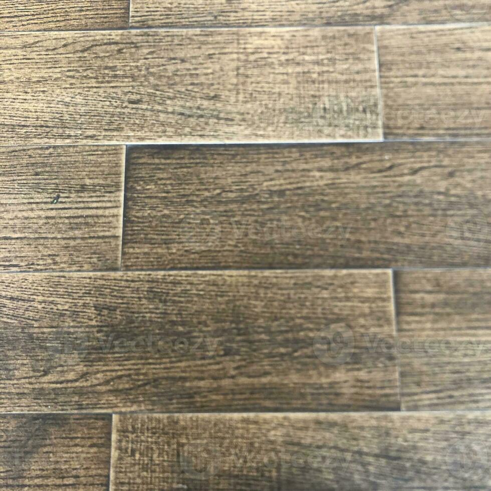 a close up of a wood floor with a dark brown color photo