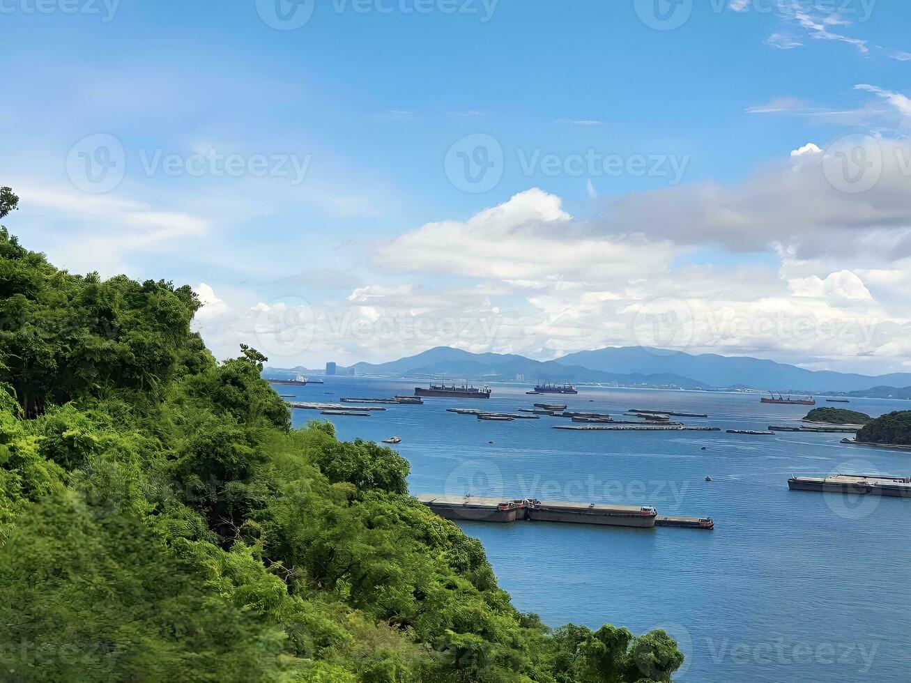 a view of the ocean from a hillside photo