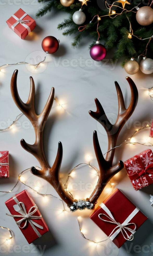 Photo Of Christmas Reindeer Antlers Wrapped With Fairy Lights Beside A Pile Of Gifts. AI Generated