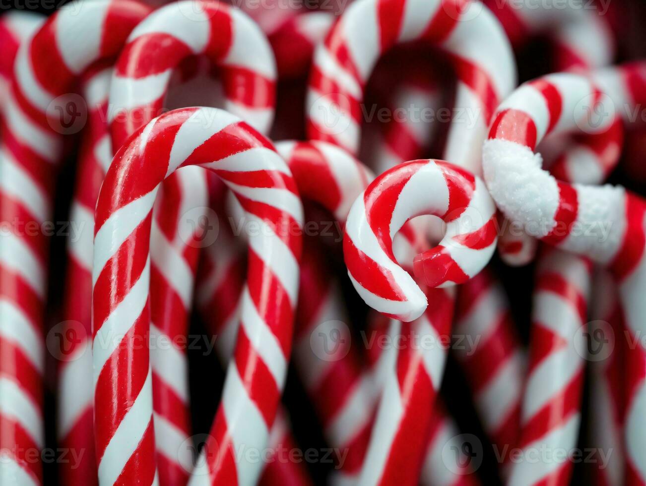 Candy Canes With Snow On Them. AI Generated photo