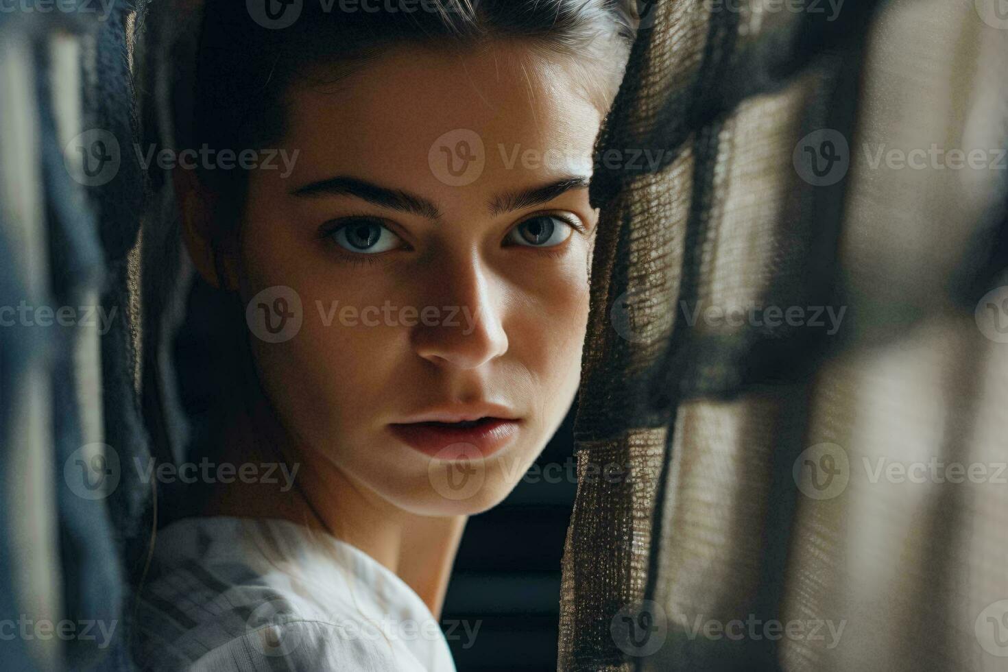 A woman peering through a delicate curtain AI Generated photo