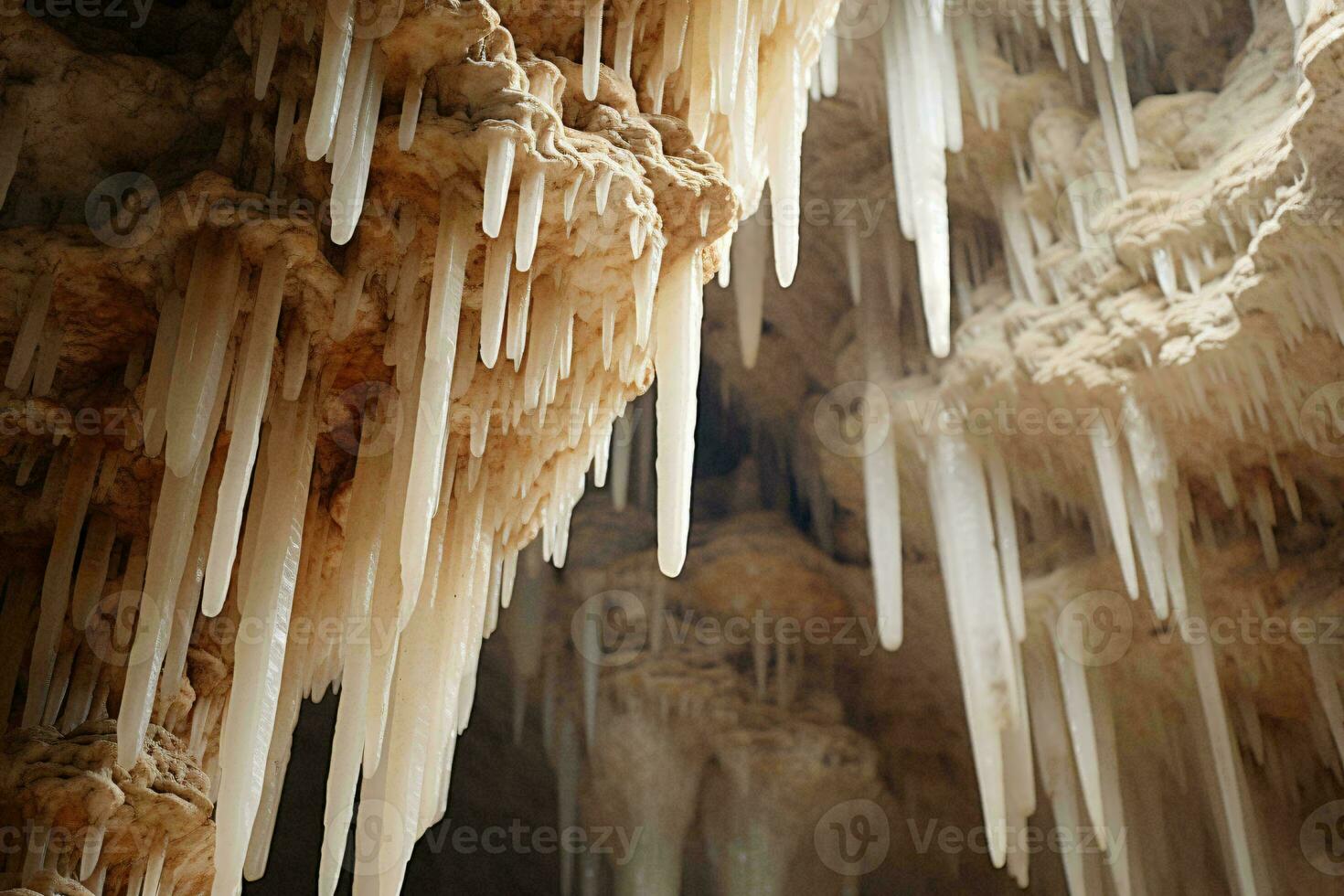 Icicles hanging from the ceiling of a cave AI Generated photo