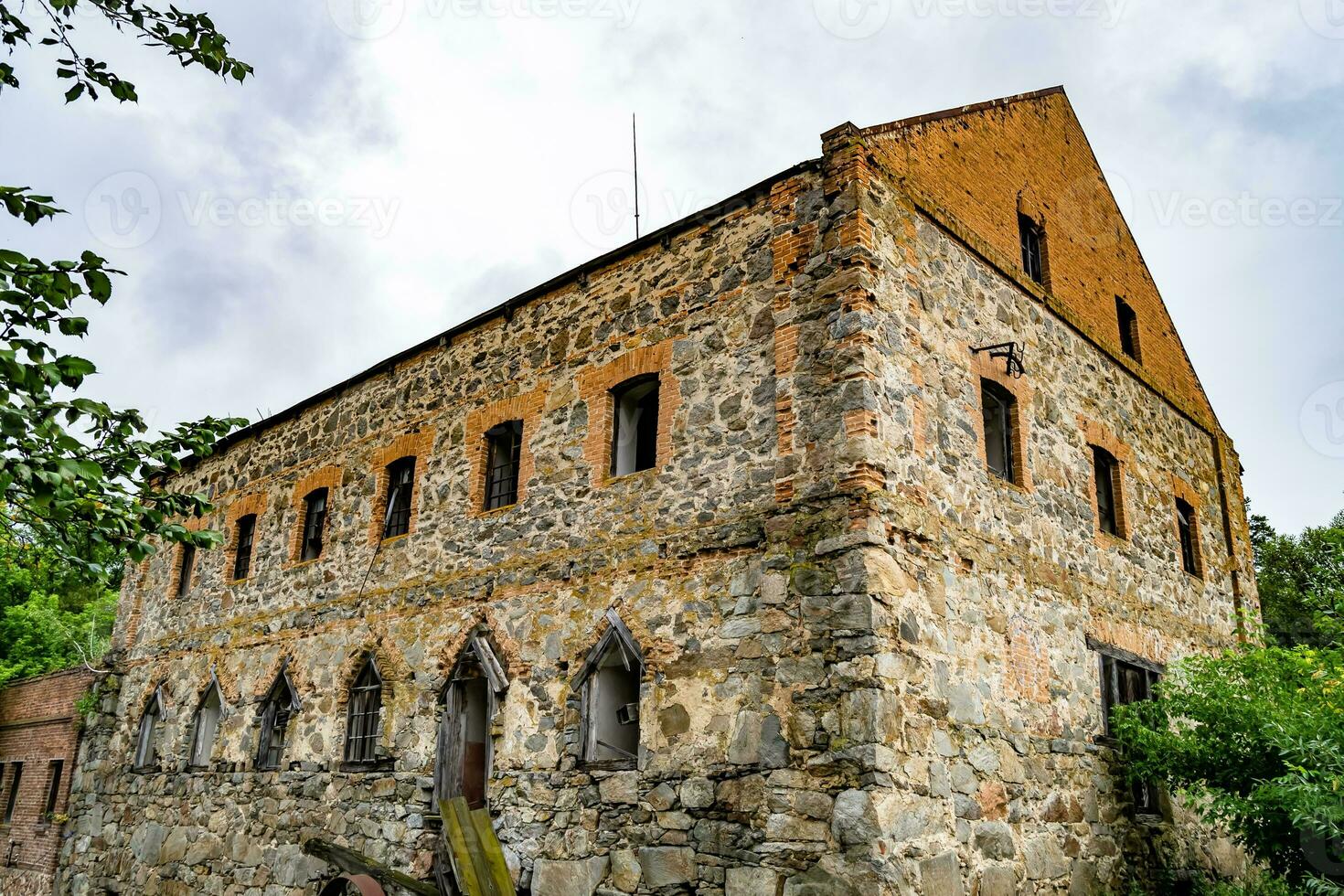 Photography on theme outstanding building beautiful brick old water mill photo