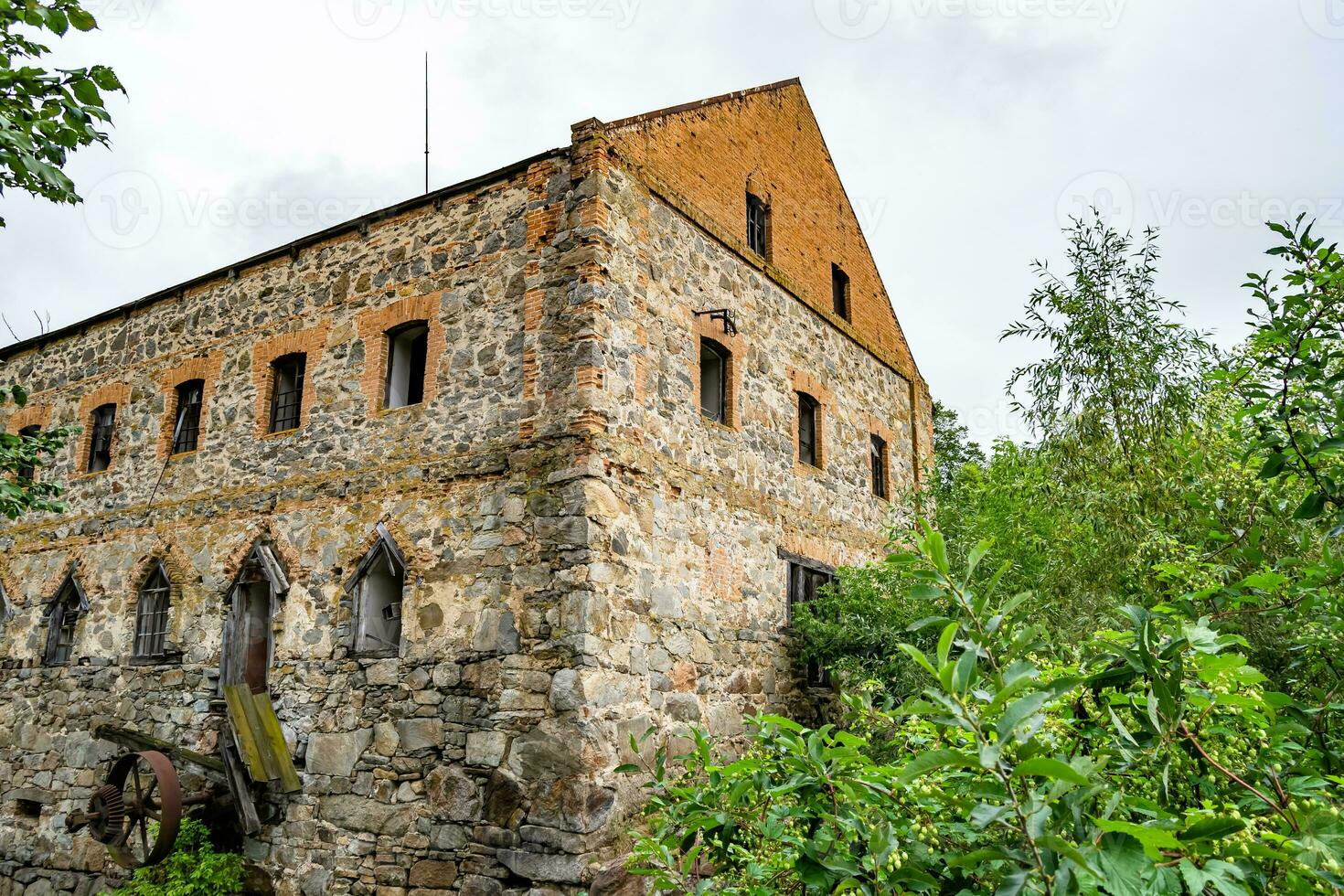 Photography on theme outstanding building beautiful brick old water mill photo