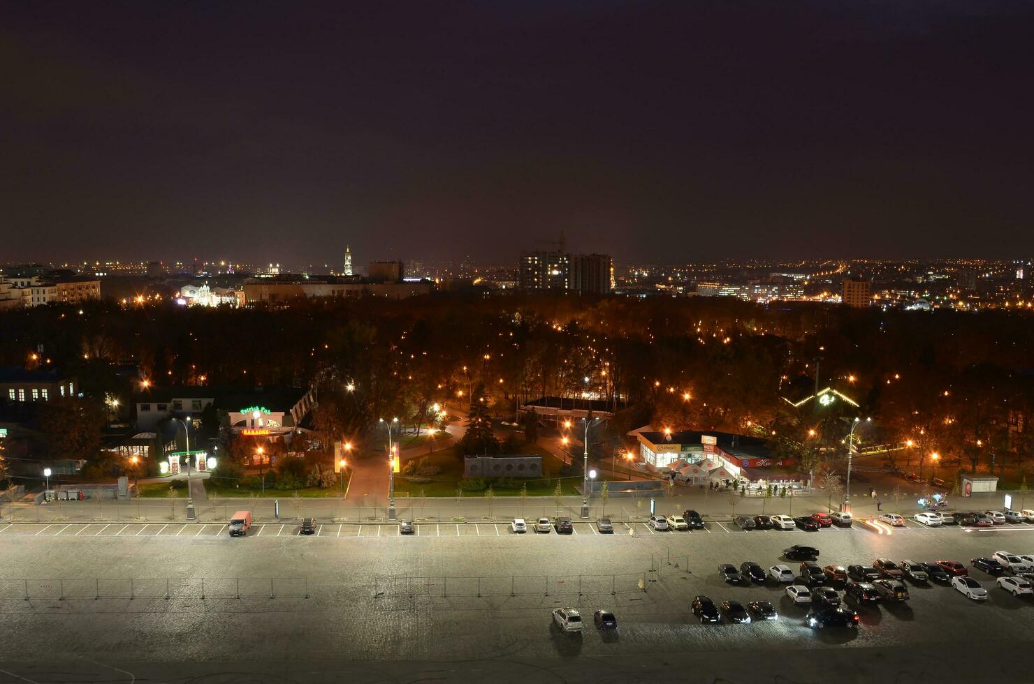 KHARKIV, UKRAINE - OCTOBER 25, 2019 Aerial view at evening sunset with streets of Kharkiv city center photo