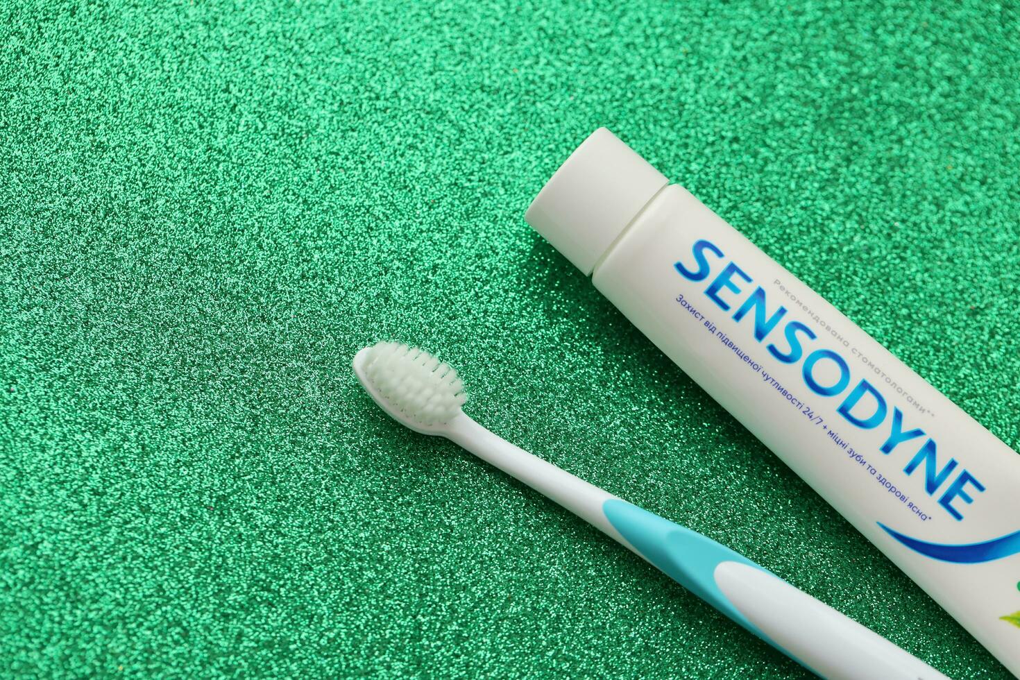 KYIV, UKRAINE - MAY 4, 2022 Sensodyne fluorine or fluor is a daily fluoride toothpaste photo
