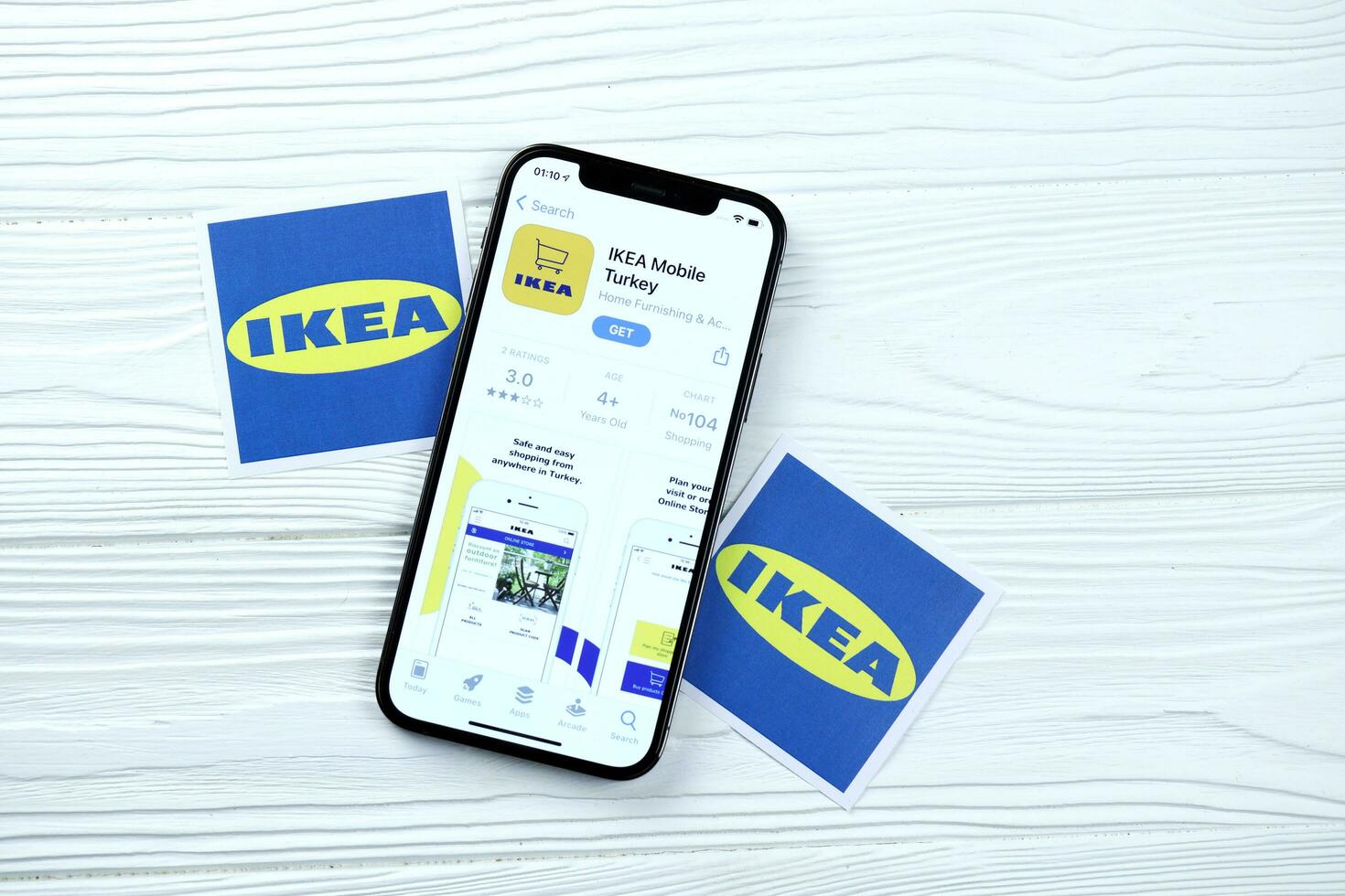 KHARKOV, UKRAINE - MARCH 5, 2021 Ikea icon and application from App store on iPhone 12 pro display screen on white table photo