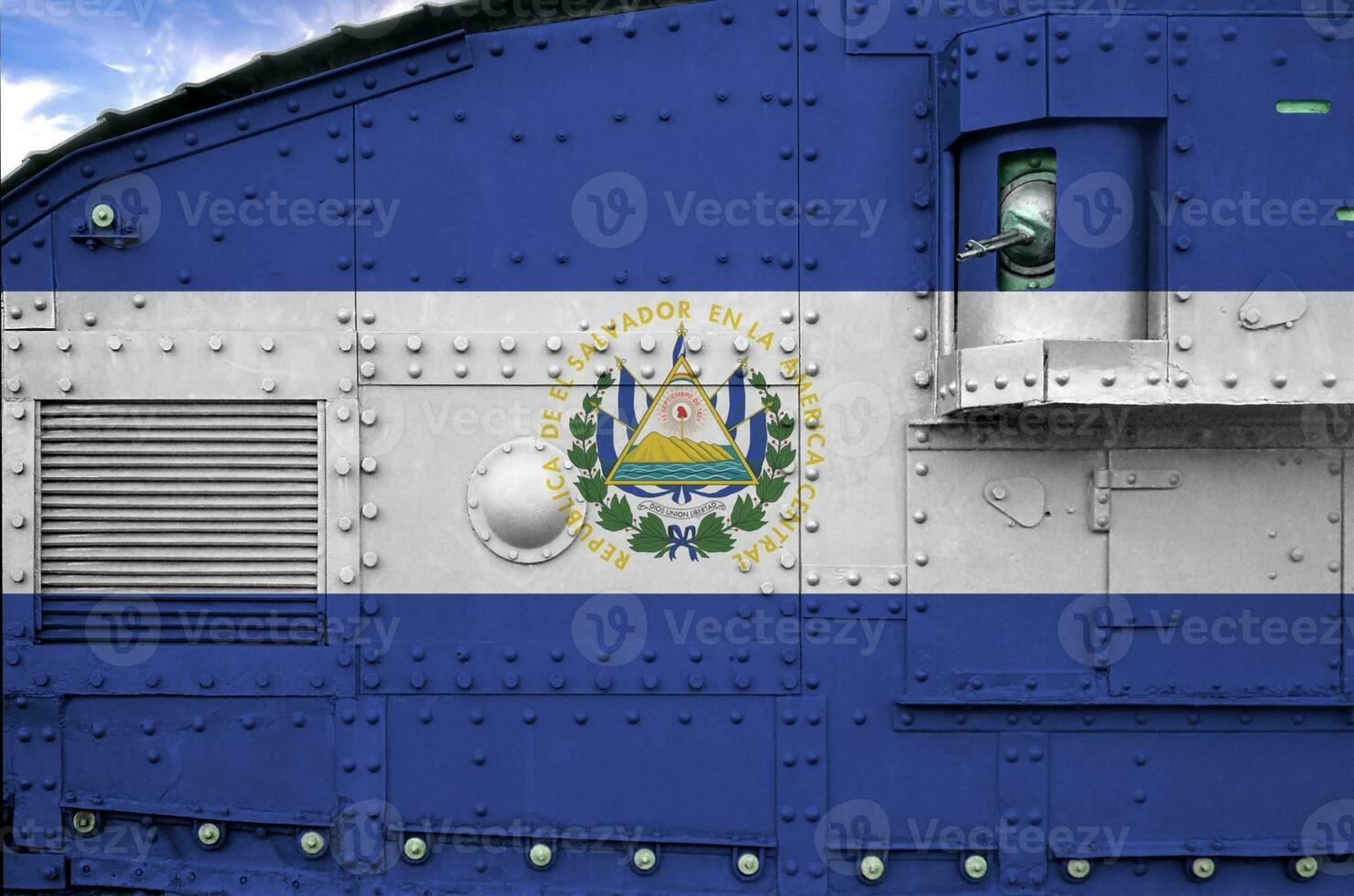El Salvador flag depicted on side part of military armored tank closeup. Army forces conceptual background photo
