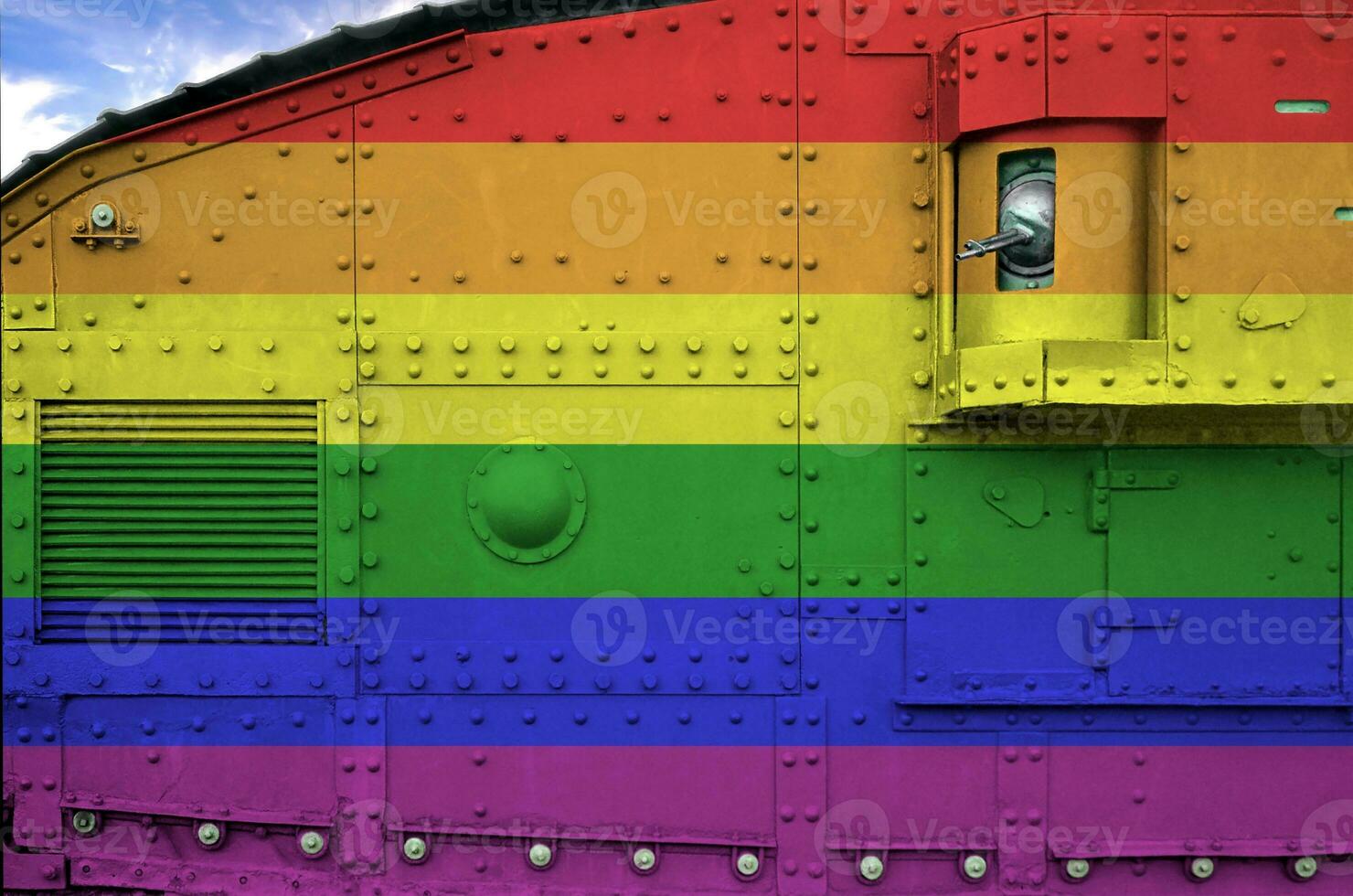 LGBT community flag depicted on side part of military armored tank closeup. Army forces conceptual background photo